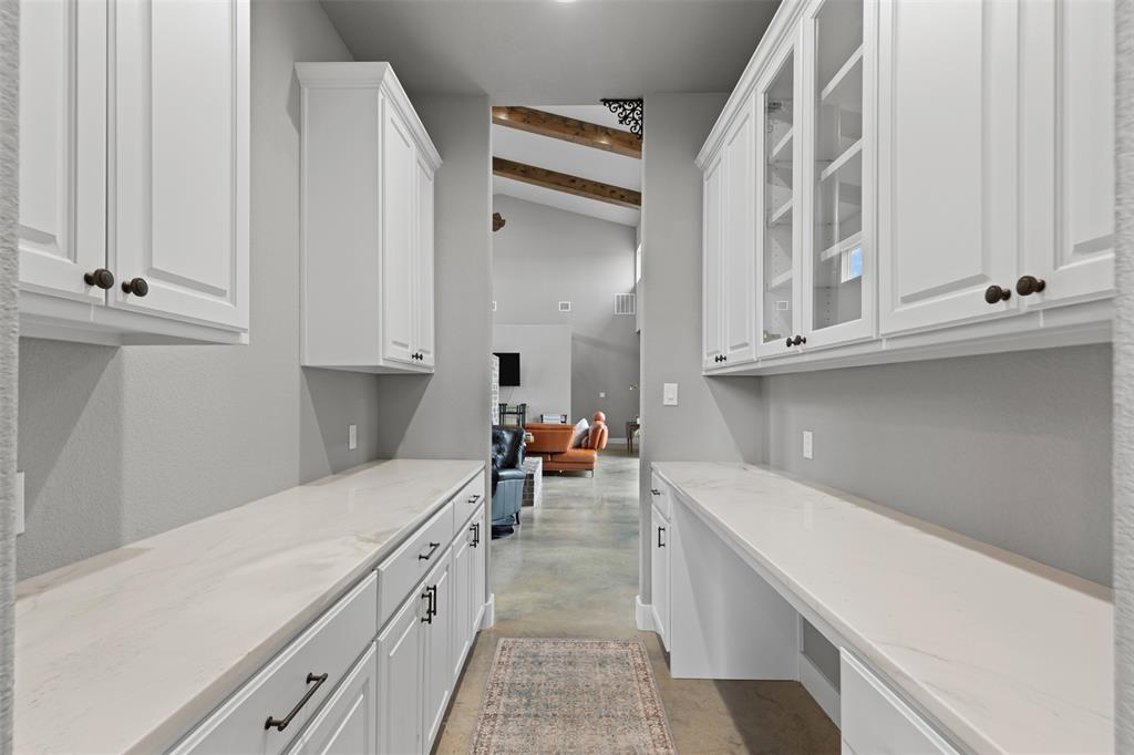 201 W Road Waxahachie, TX 75165 - Photo 20 of 40 a storage room with cabinets