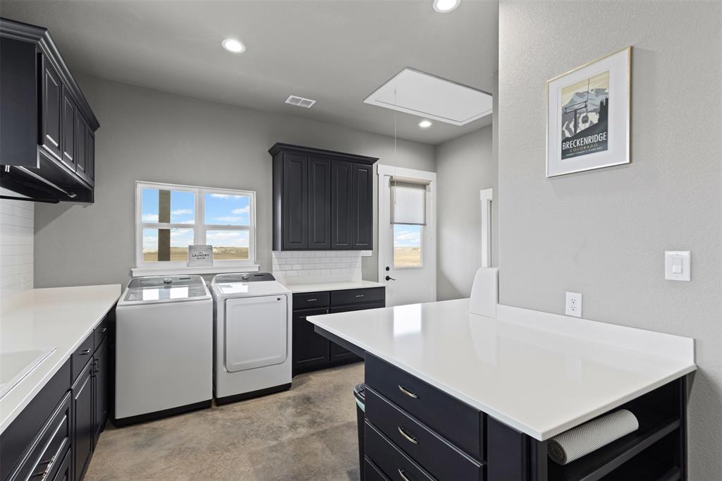 201 W Road Waxahachie, TX 75165 - Photo 22 of 40 a kitchen with a stove refrigerator and sink