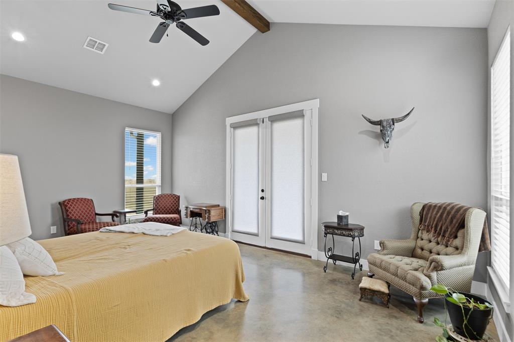 201 W Road Waxahachie, TX 75165 - Photo 25 of 40 a bedroom with a bed and window