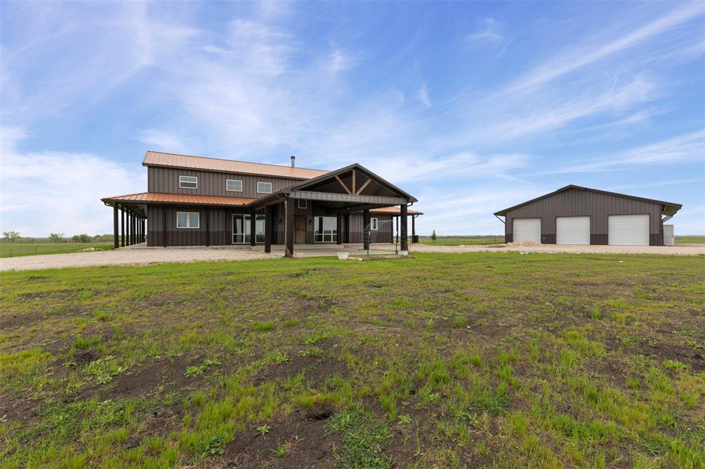201 W Road Waxahachie, TX 75165 - Photo 31 of 40 a front view of a house with garden