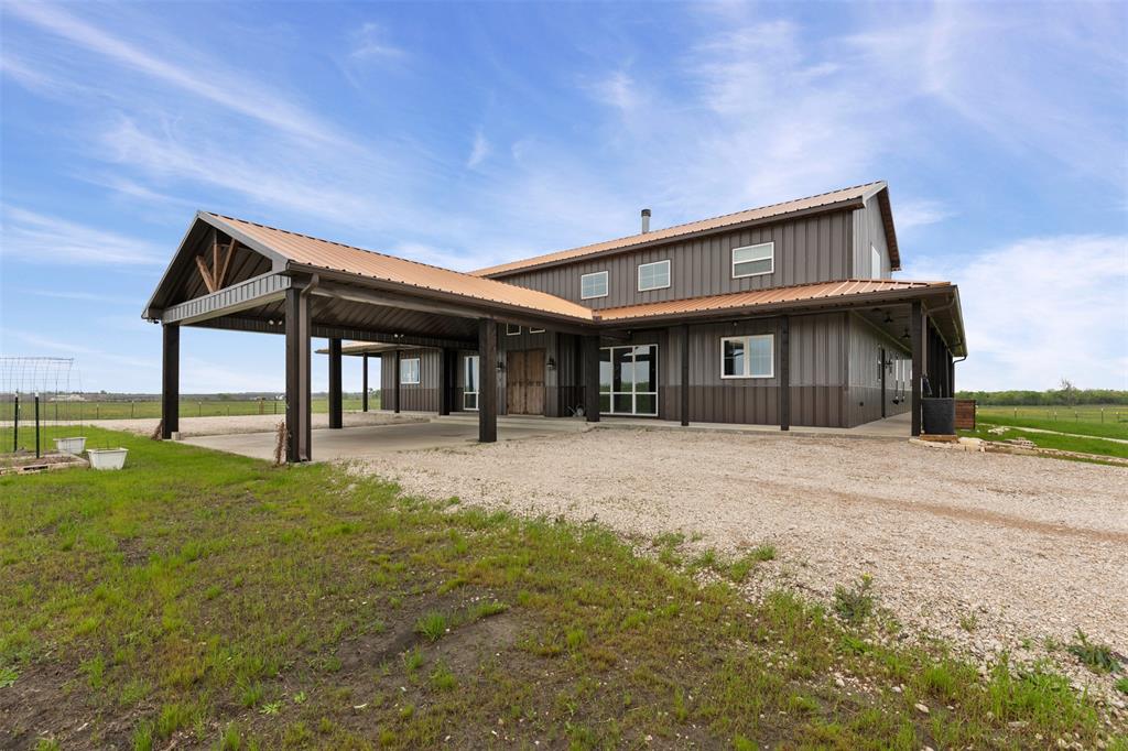 201 W Road Waxahachie, TX 75165 - Photo 32 of 40 a front view of a house with garden