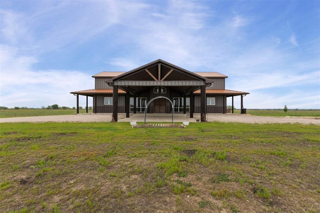 201 W Road Waxahachie, TX 75165 - Photo 33 of 40 a front view of a house with a garden