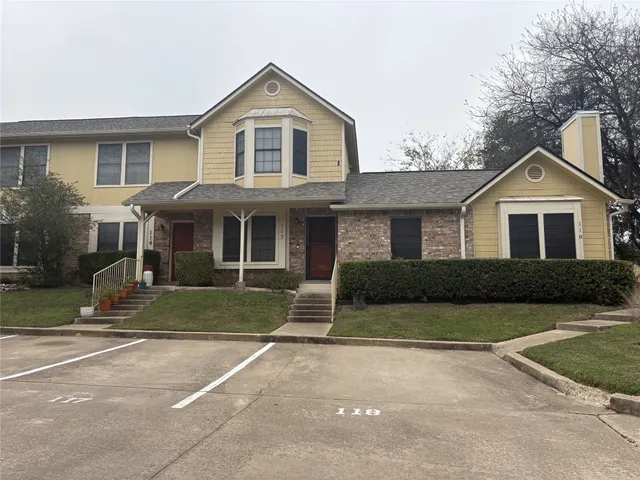 a view of street with houses