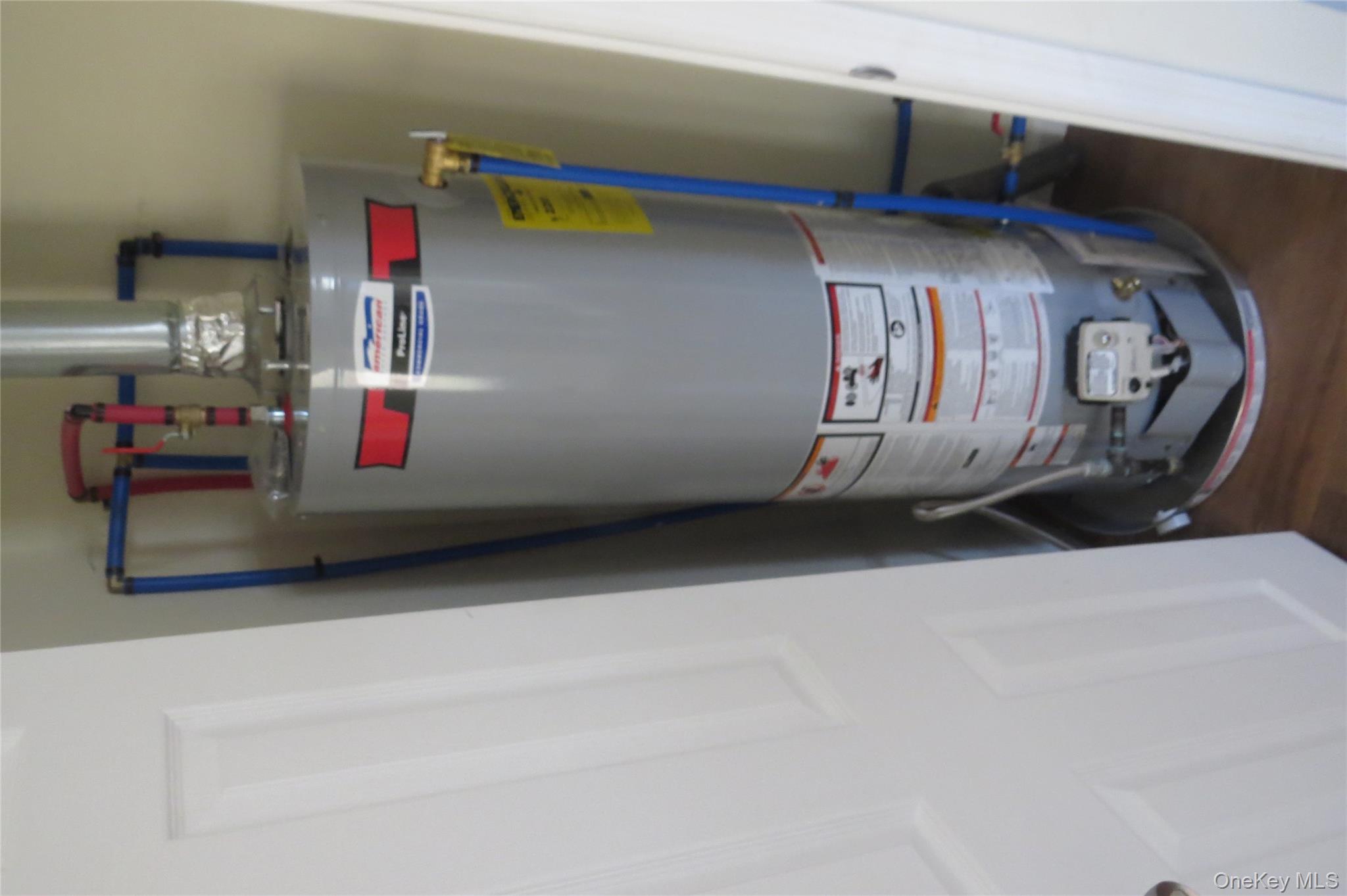 723 Beekman, Unit 64 Hopewell Junction, NY 12524 - Photo 14 of 28 a view or water heater room