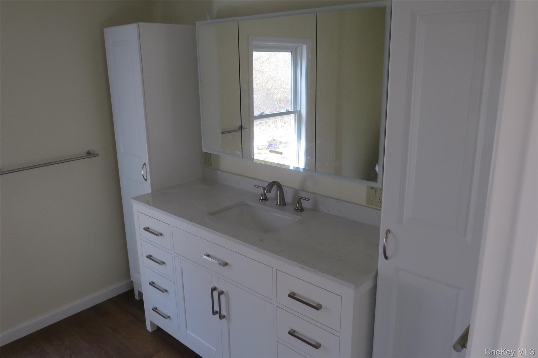 723 Beekman, Unit 64 Hopewell Junction, NY 12524 - Photo 16 of 28 a bathroom with a sink and a window