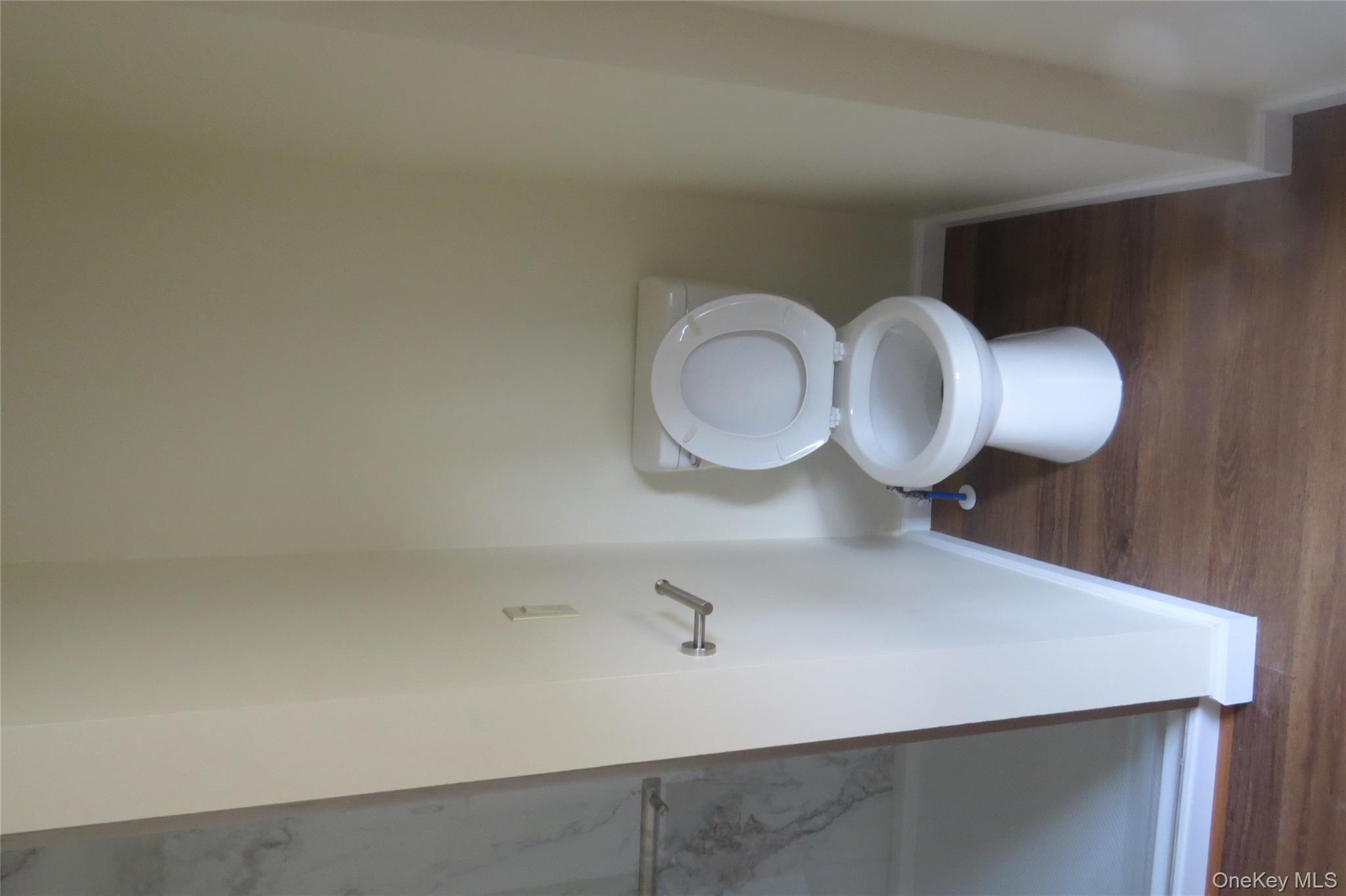 723 Beekman, Unit 64 Hopewell Junction, NY 12524 - Photo 17 of 28 a bathroom with a toilet and a sink