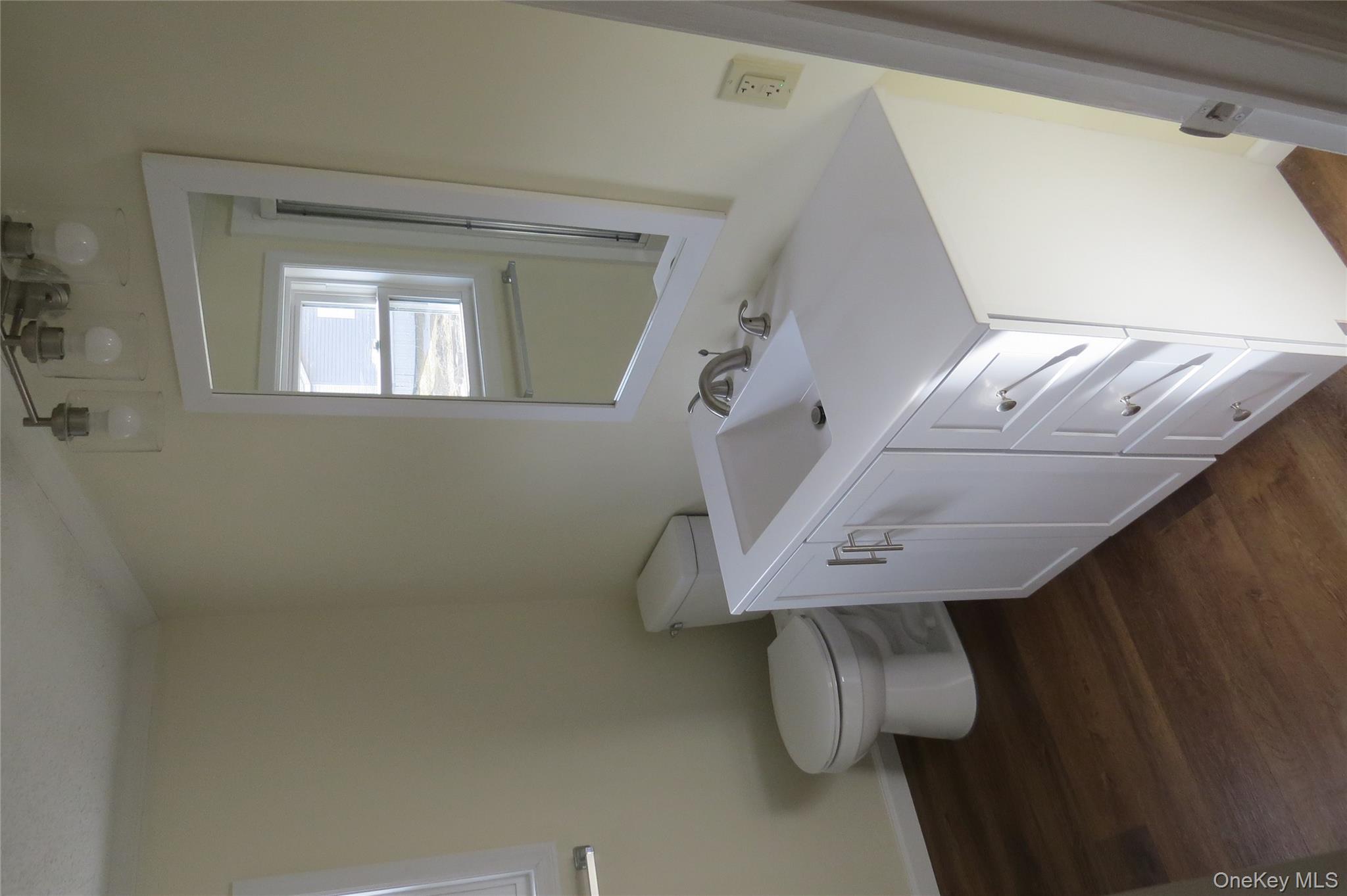 723 Beekman, Unit 64 Hopewell Junction, NY 12524 - Photo 21 of 28 a bathroom with a sink and a toilet