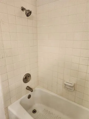a bathroom with a sink and a shower