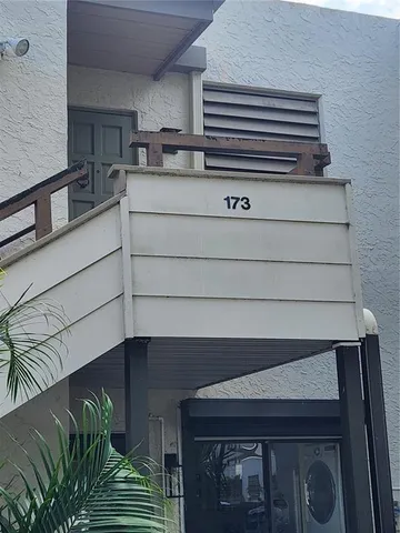 a kitchen with a stove and cabinets