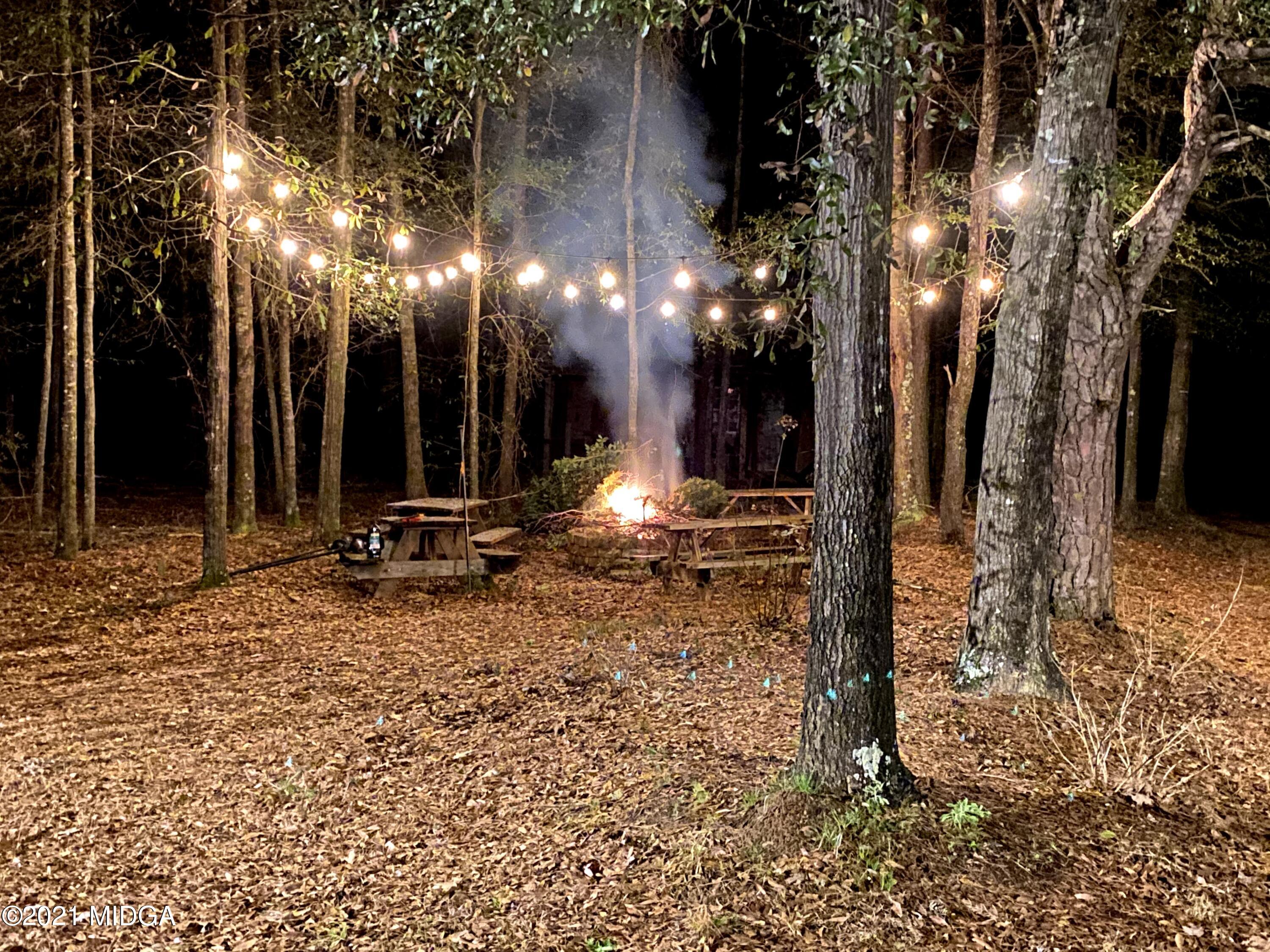 619 Harper Road Perry, GA 31069 - Photo 7 of 27 a view of outdoor space with trees