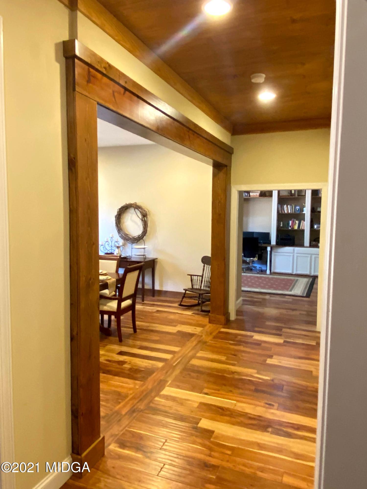 619 Harper Road Perry, GA 31069 - Photo 10 of 27 a view of a indoor basketball court