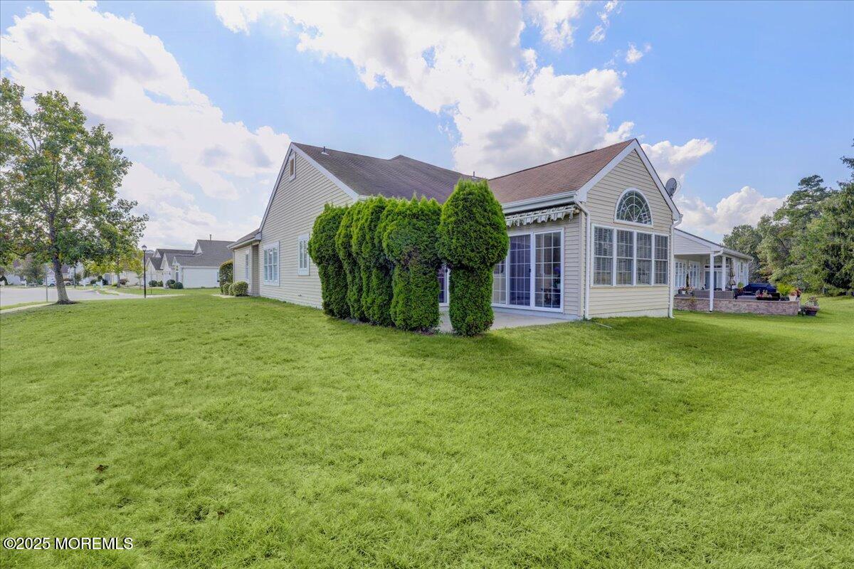 53 Pine Valley Road Jackson, NJ 08527 - Photo 4 of 51 a front view of a house with garden