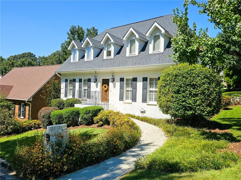 2166 Heritage Heights Decatur, GA 30033 - Photo 1 of 1 a front view of a house with a yard