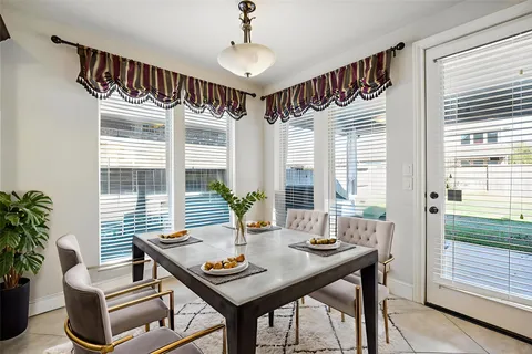 a view of a livingroom with furniture and window