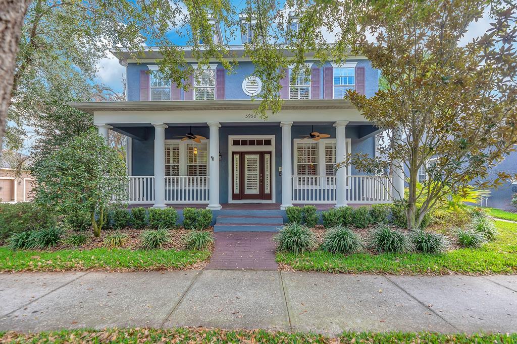 5950 Fishhawk Crossing Boulevard Lithia, FL 33547 - Photo 1 of 1 a front view of a house with garden