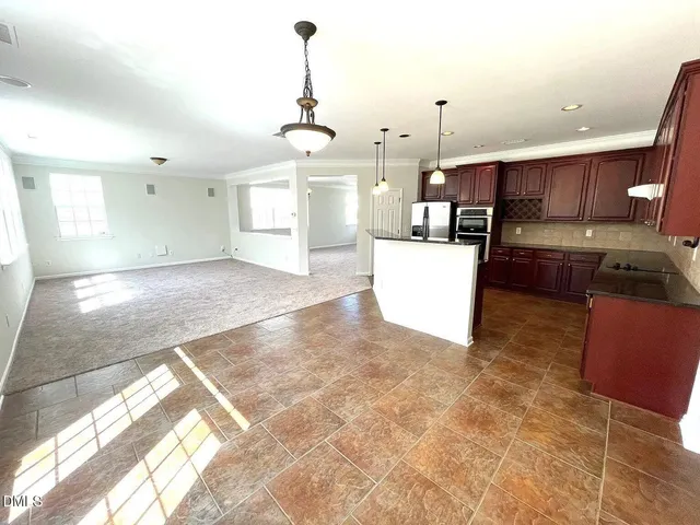 a view of kitchen and living room