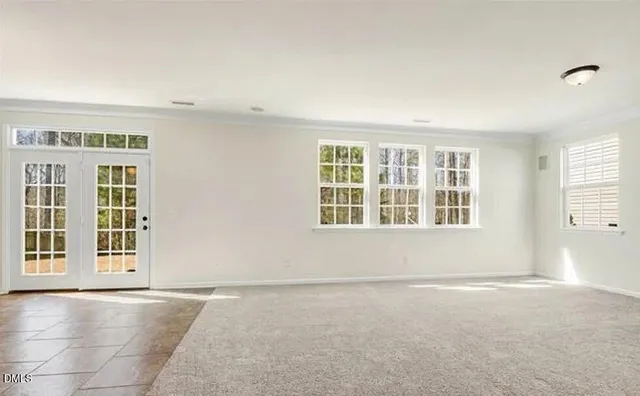 an empty room with windows