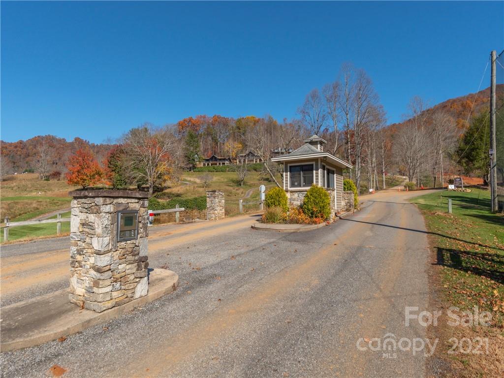 51 Forest Road Canton, NC 28716 - Photo 20 of 26 a view of a lake with a houses
