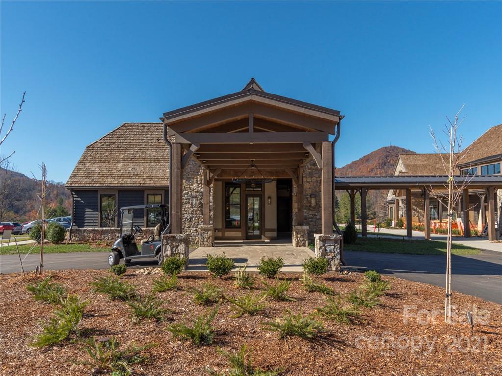 51 Forest Road Canton, NC 28716 - Photo 21 of 26 a view of a house with backyard porch and sitting area