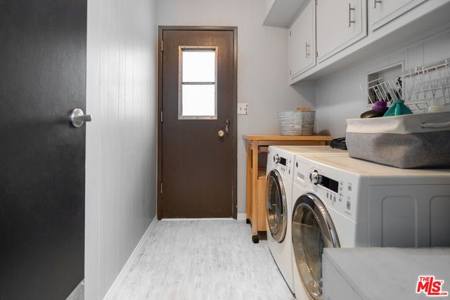 a view of kitchen and washer and dryer