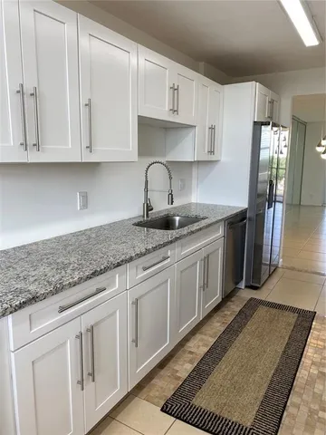 a bathroom with a toilet and a bathtub
