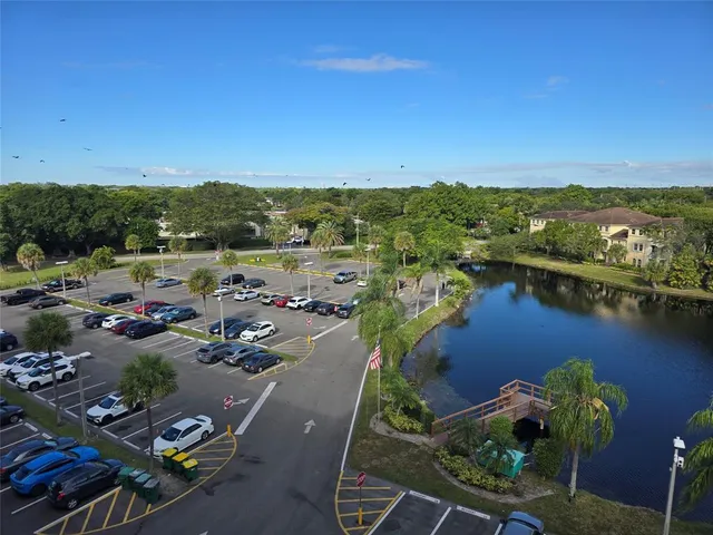 a view of a lake with a building in the background