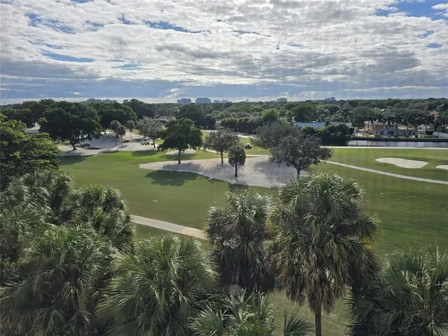 a view of a lake in middle of the town