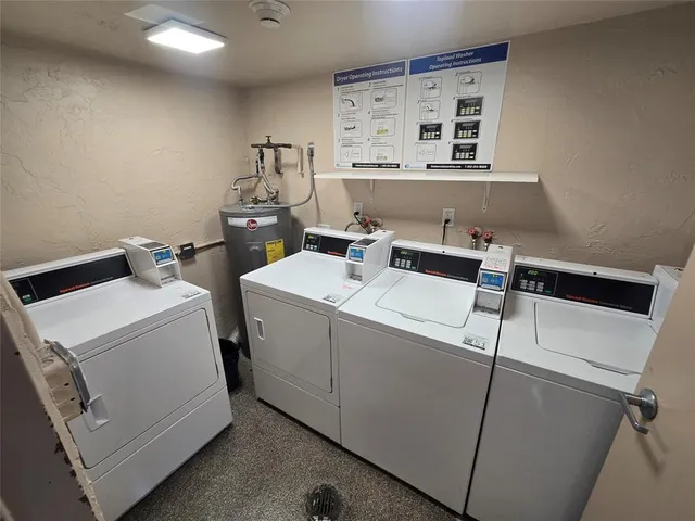 an aerial view of a house with outdoor space and lake view