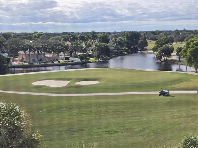 a view of a lake with a city