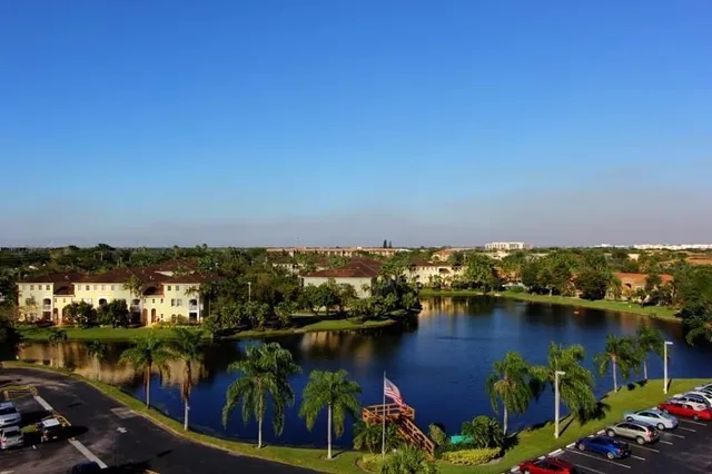 a view of swimming pool with a yard