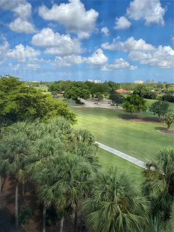 a view of lake with green space
