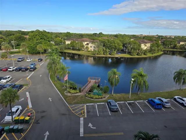 an aerial view of a house with outdoor space swimming pool and outdoor seating