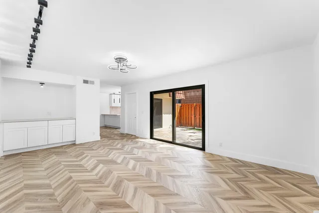 a view of a room with an empty space