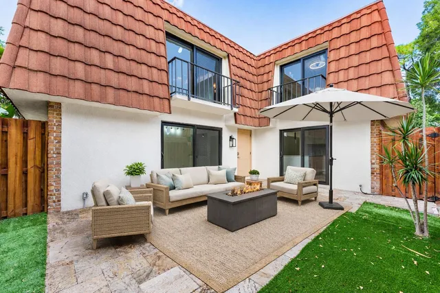 a view of a park with a tree