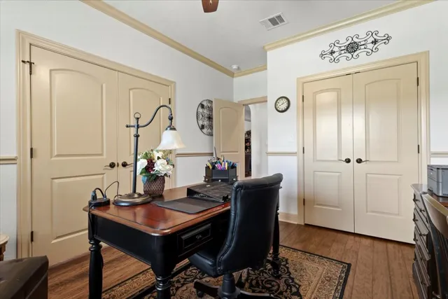 a room with a table and chairs