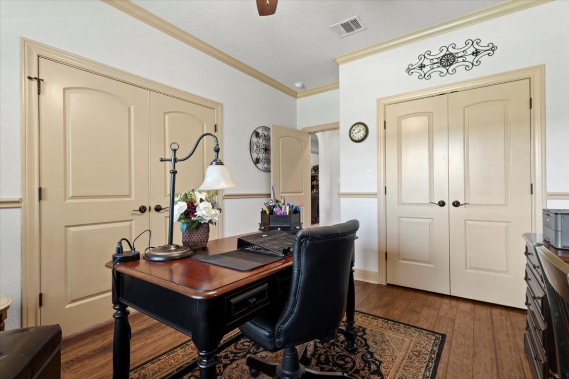 224 Whitney Woods Circle Georgetown, TX 78633 - Photo 28 of 40 a room with a table and chairs