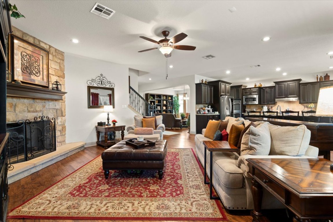 224 Whitney Woods Circle Georgetown, TX 78633 - Photo 10 of 40 a living room with furniture and kitchen view