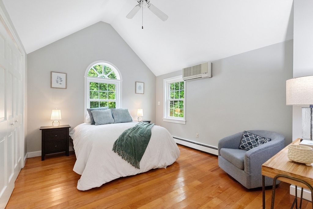 148 Wood Street, Unit 4 Lexington, MA 02421 - Photo 12 of 26 a living room with a bed furniture and a window