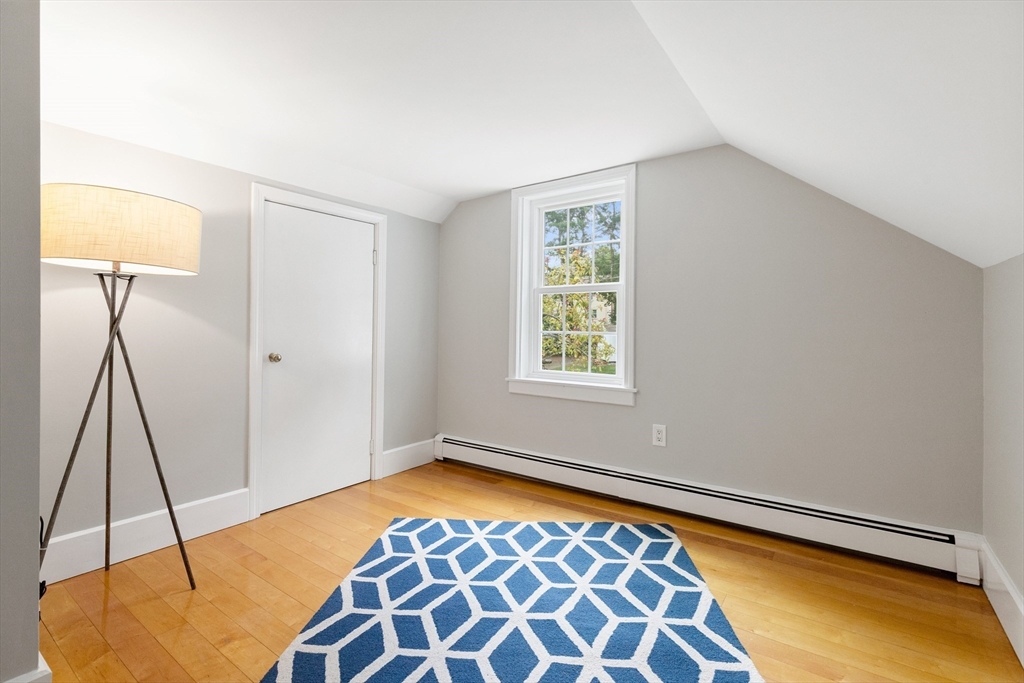 148 Wood Street, Unit 4 Lexington, MA 02421 - Photo 17 of 26 a view of an empty room with a window