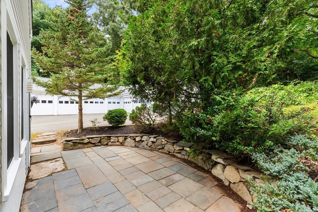 148 Wood Street, Unit 4 Lexington, MA 02421 - Photo 20 of 26 a view of a pathway with a yard