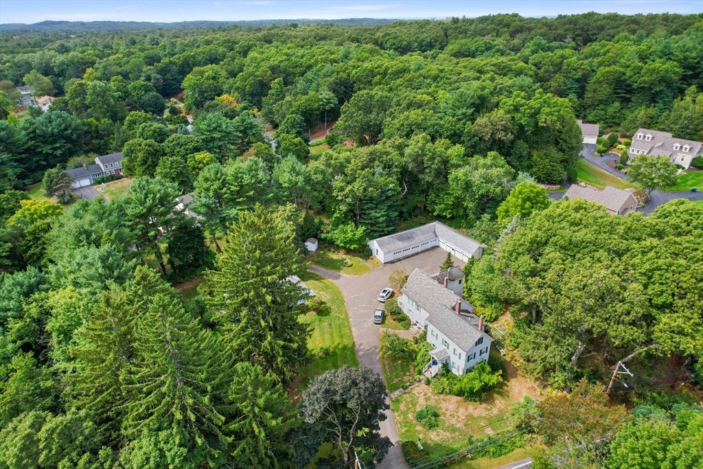 148 Wood Street, Unit 4 Lexington, MA 02421 - Photo 22 of 26 an aerial view of residential house with outdoor space and trees all around