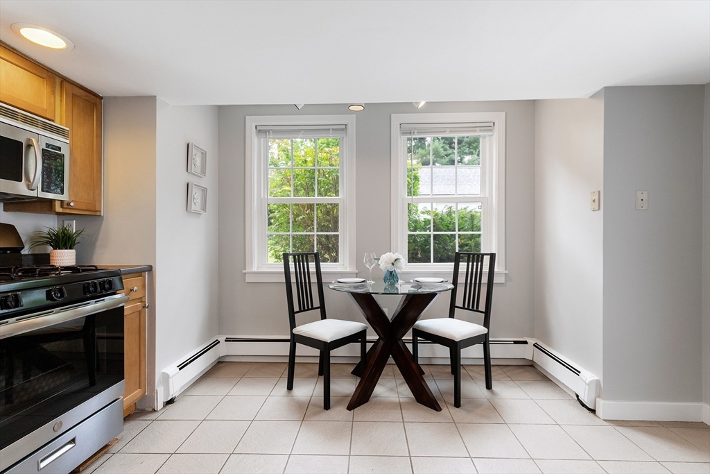 148 Wood Street, Unit 4 Lexington, MA 02421 - Photo 4 of 26 a dining room with furniture and window