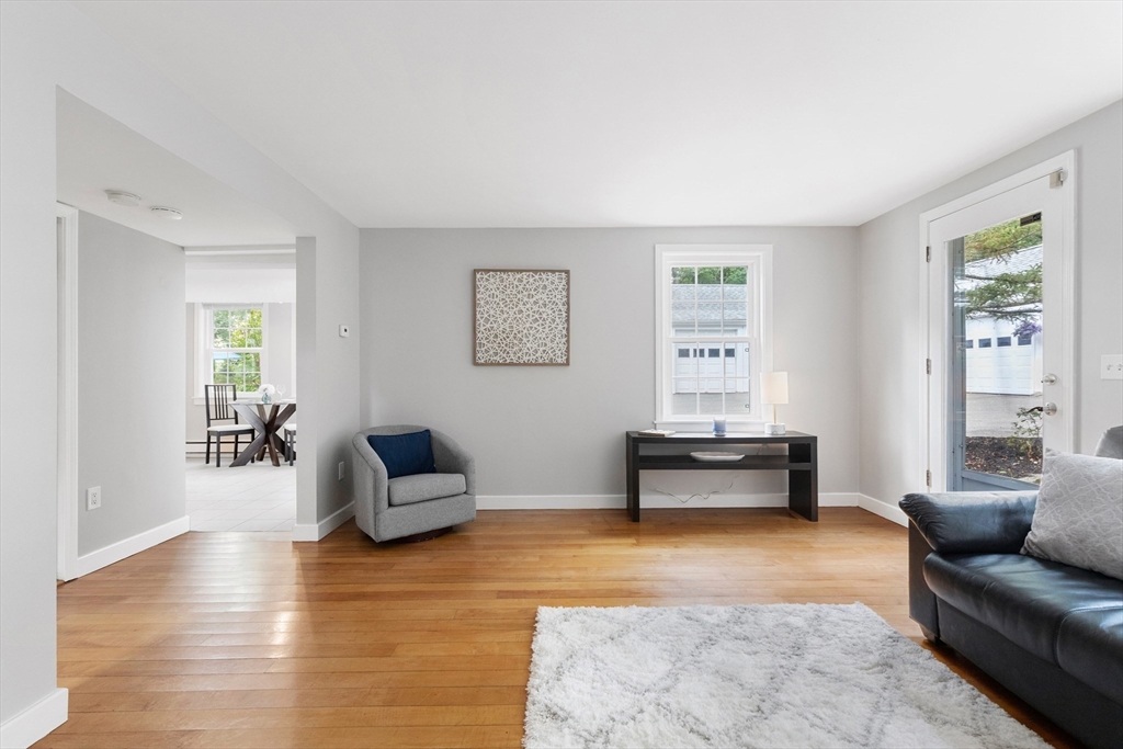 148 Wood Street, Unit 4 Lexington, MA 02421 - Photo 9 of 26 a living room with furniture and a wooden floor