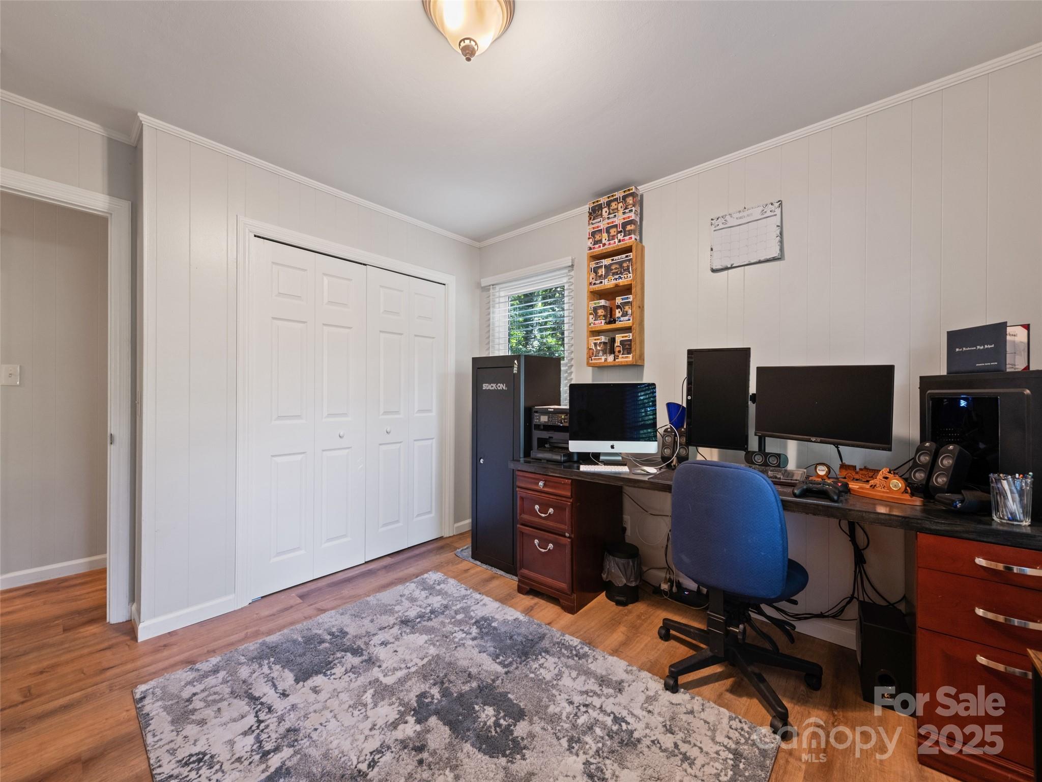 263 Blanton Street Columbus, NC 28722 - Photo 29 of 45 a view of a workspace with furniture and a window
