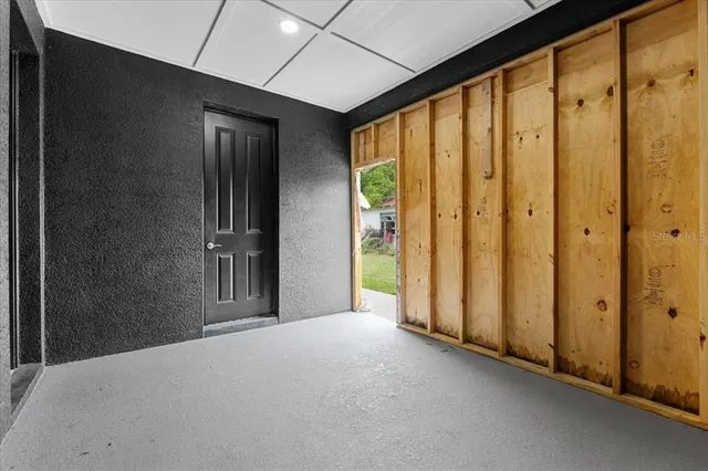 a view of hallway with livingroom