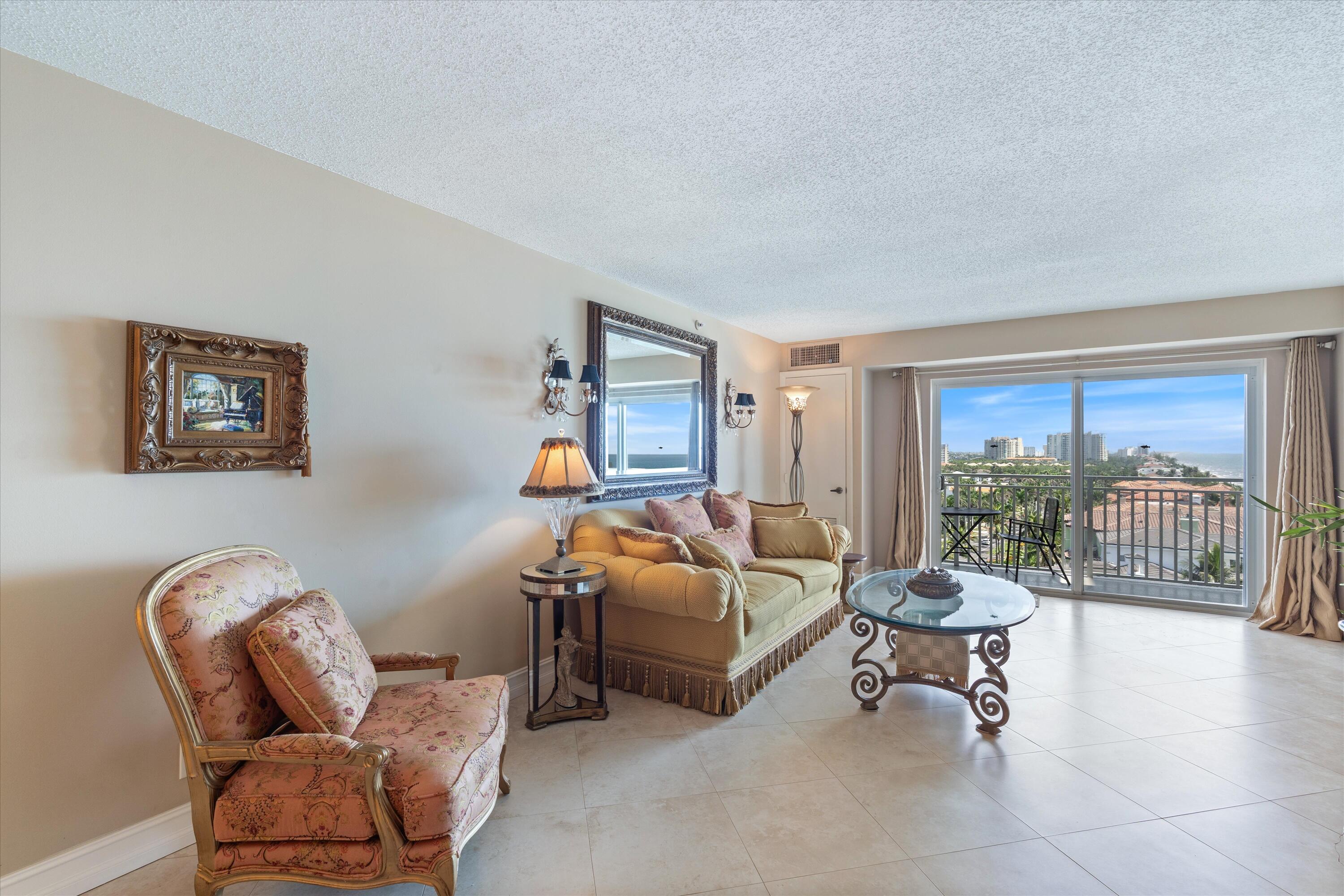 4505 South Ocean Boulevard, Unit 904 Highland Beach, FL 33487 - Photo 28 of 39 a living room with furniture and a window
