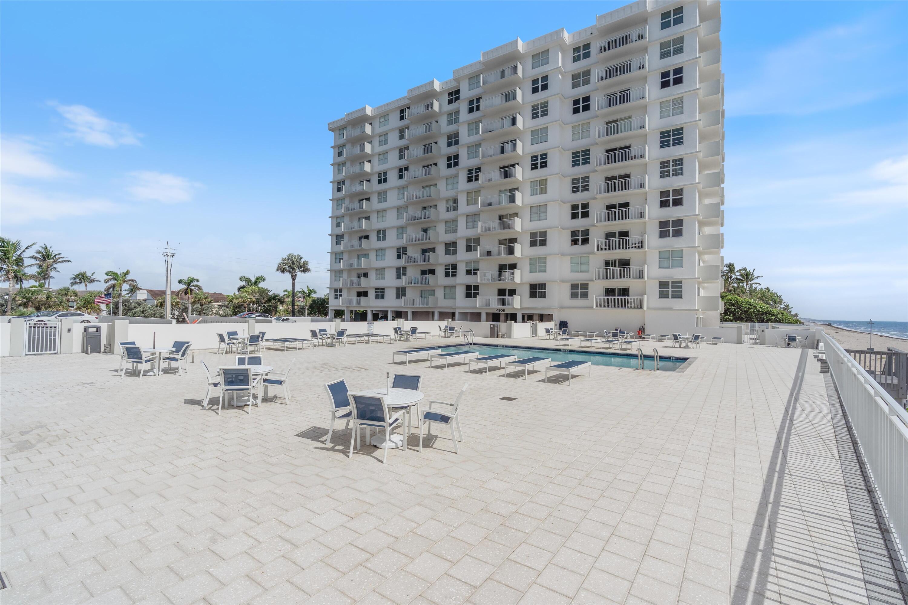 4505 South Ocean Boulevard, Unit 904 Highland Beach, FL 33487 - Photo 30 of 39 a view of terrace with lawn chairs