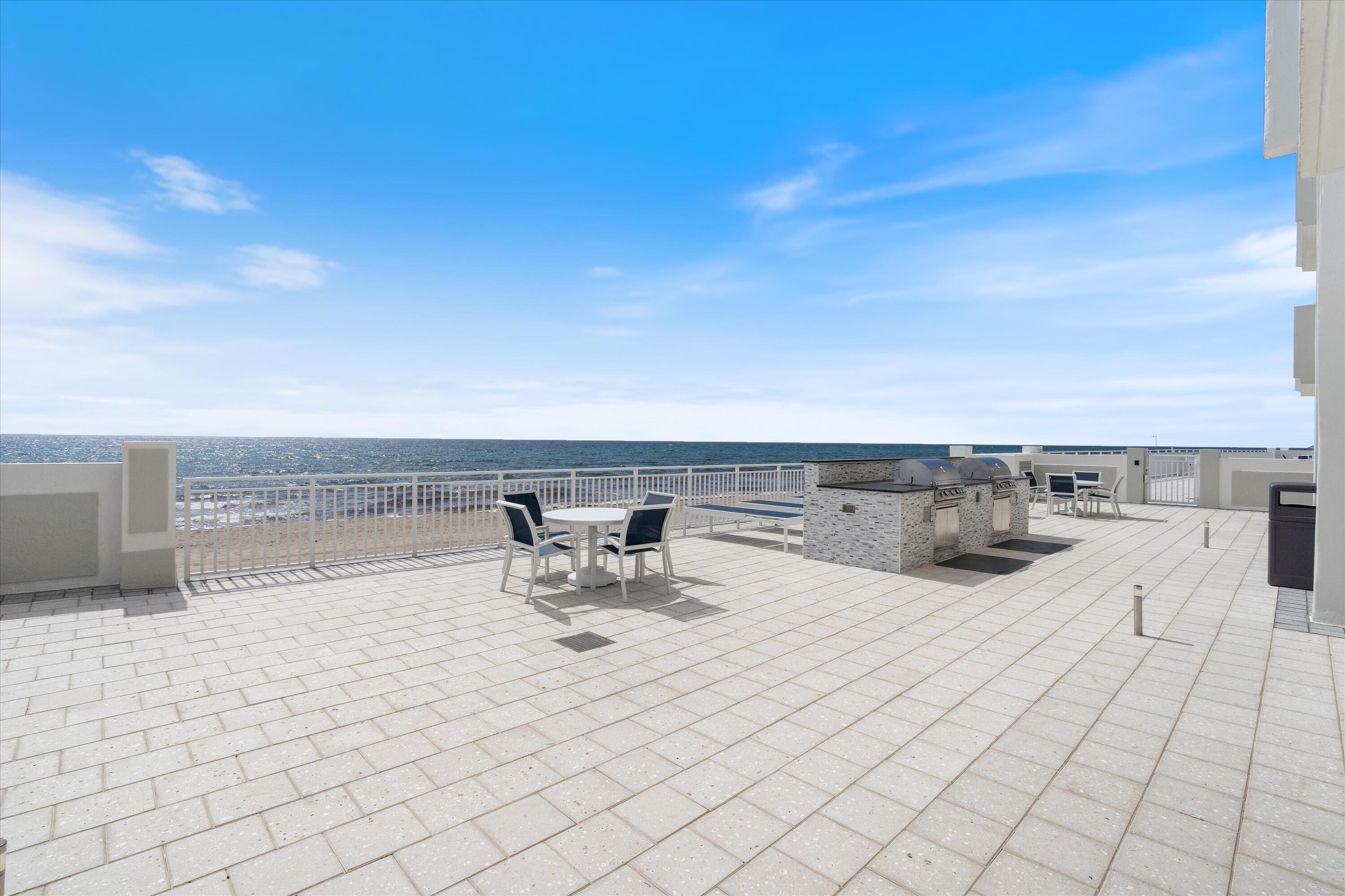 4505 South Ocean Boulevard, Unit 904 Highland Beach, FL 33487 - Photo 31 of 39 a view of a terrace with chairs