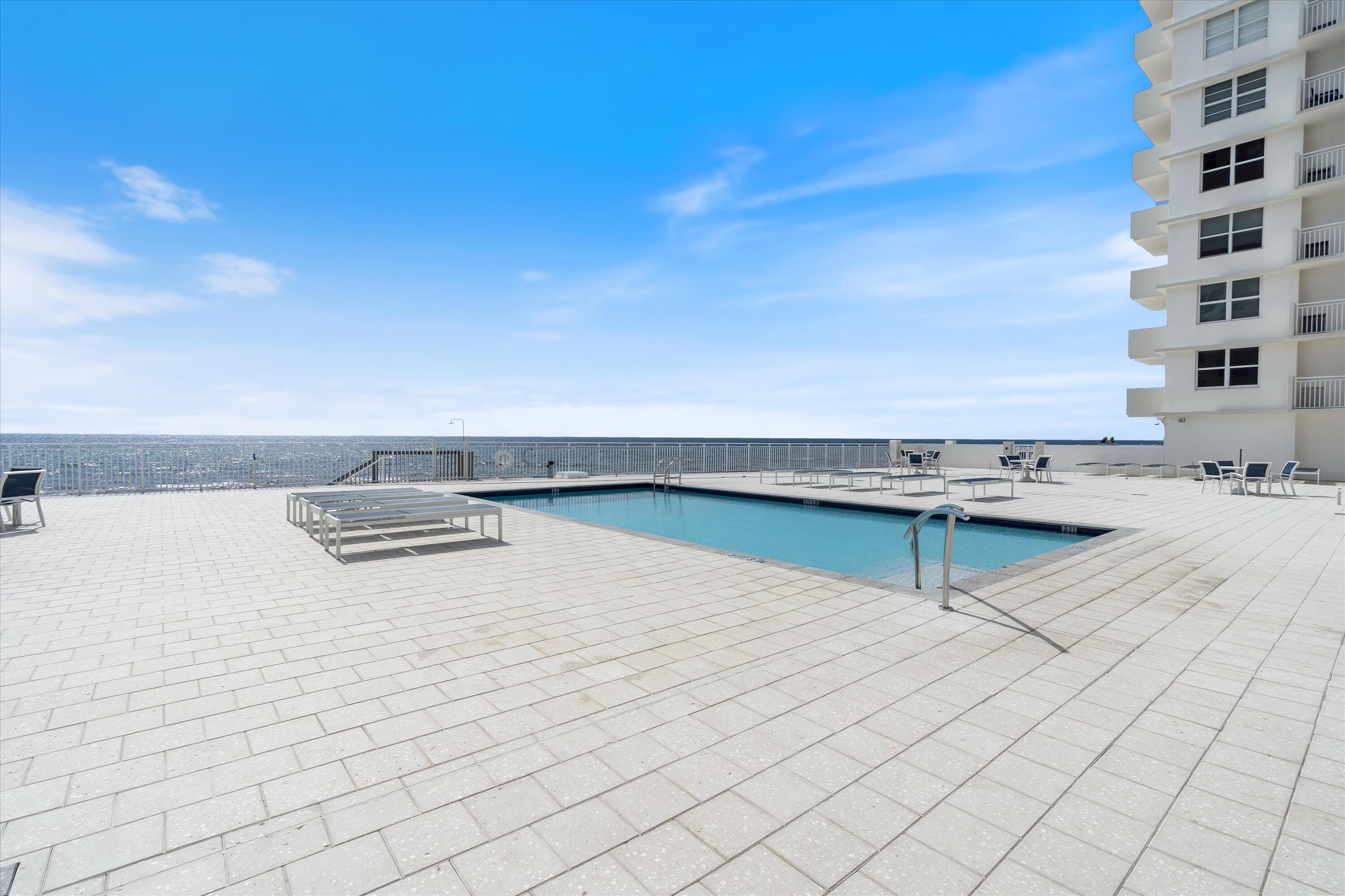 4505 South Ocean Boulevard, Unit 904 Highland Beach, FL 33487 - Photo 32 of 39 a view of swimming pool with outdoor seating