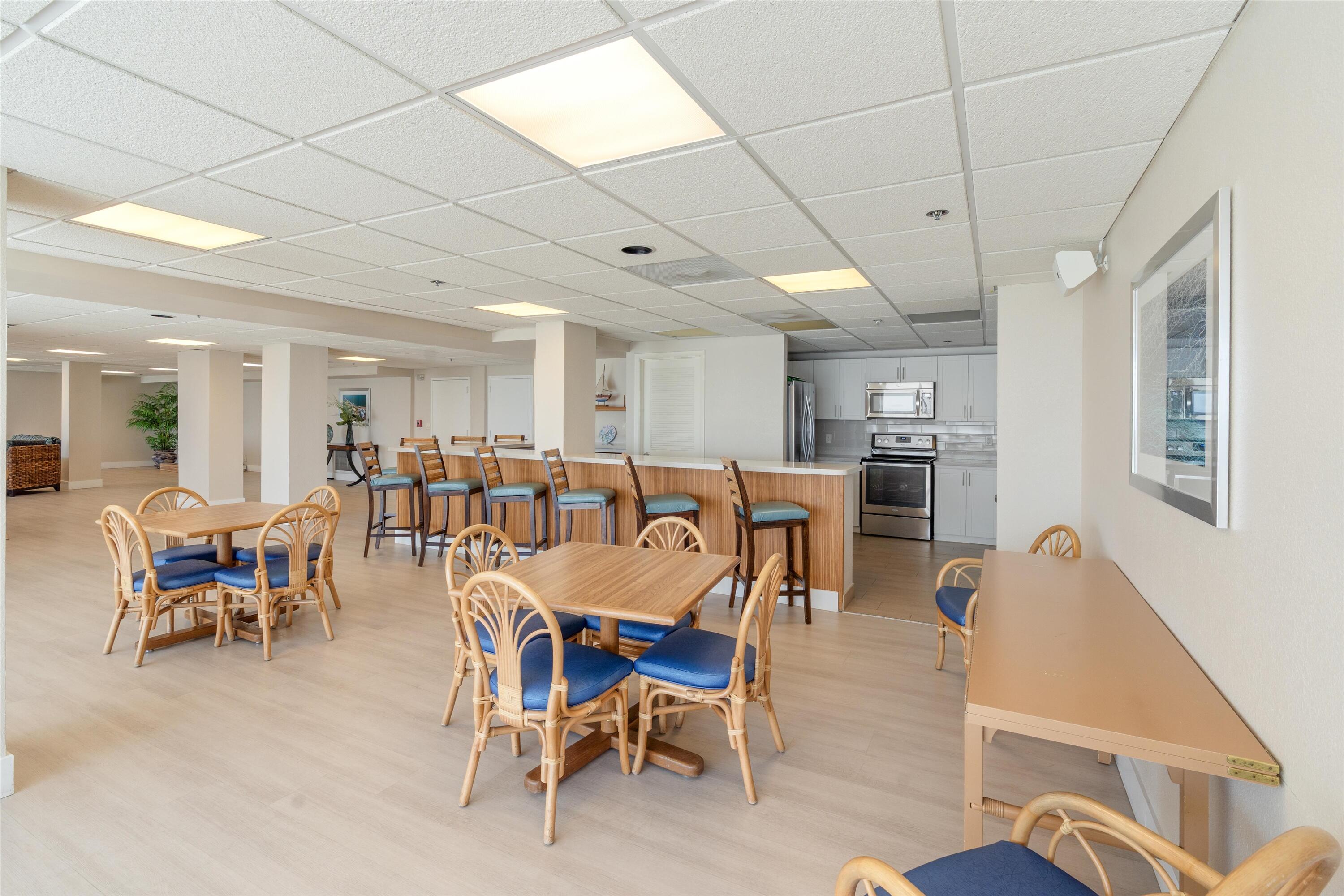 4505 South Ocean Boulevard, Unit 904 Highland Beach, FL 33487 - Photo 38 of 39 a view of a dining room with furniture